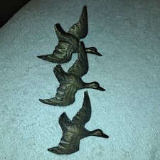 Vintage Graduating Flying Metal Ducks