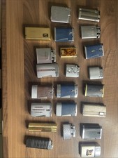 22 Ronson Pocket Lighters Incl