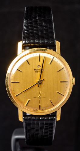 Marvin revue gold vertical - revue,