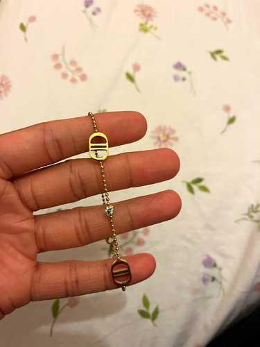 Gold tone metal ball - tone,