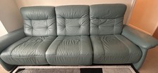 Large green leather recliner