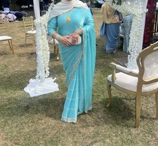 Turquoise Blue Embellished Saree With Heavy Border