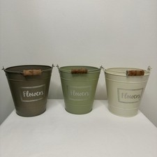Three Small Metal Buckets With