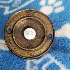 Antique brass & ceramic door bell press push button. 2  1/2 inches across. 