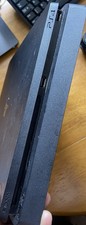 Sony PlayStation 4 Slim with 2