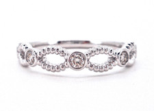 14K WHITE GOLD .20CTW ROUND DIAMOND TWIST BEZEL BAND