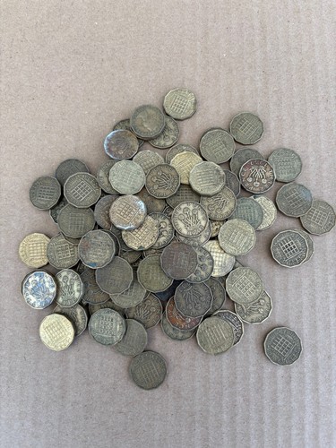 Brass three pence pieces - 95,