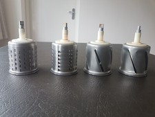 Grating and slicing drums for a Kenwood A928 or A.948 slicer and shredder.