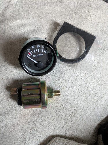 Oil pressure gauge - with,