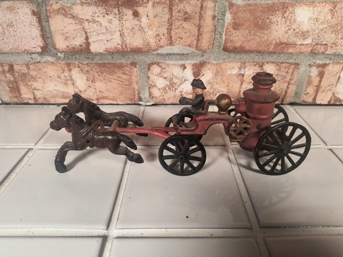 Antique cast iron horse drawn - cast,