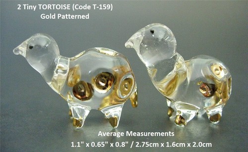 Pair tiny glass tortoise - of,
