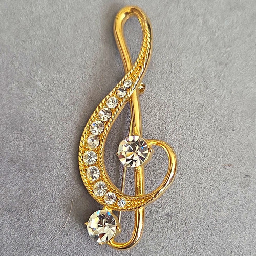 Gold tone treble clef - tone,