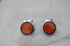 suzuki    TS90,  TS100 FRONT REFLECTOR AND BRACKET  NOS  