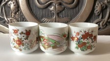 Three Japanese Porcelain Saki Cups.