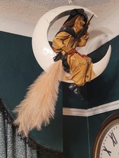 Vintage Witch Sitting On The