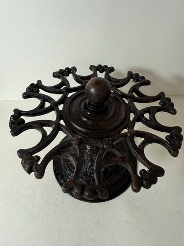 Ornate cast iron trivet - cast, stand