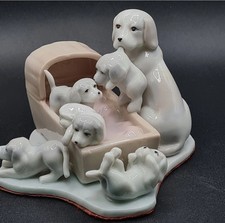 PORCELAIN MOTHER DOG AND 5