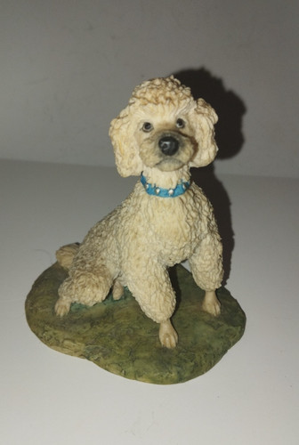 Seated white poodle figure - poodle,
