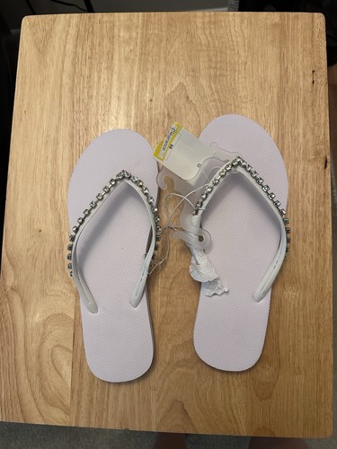 White flip flops with - white,