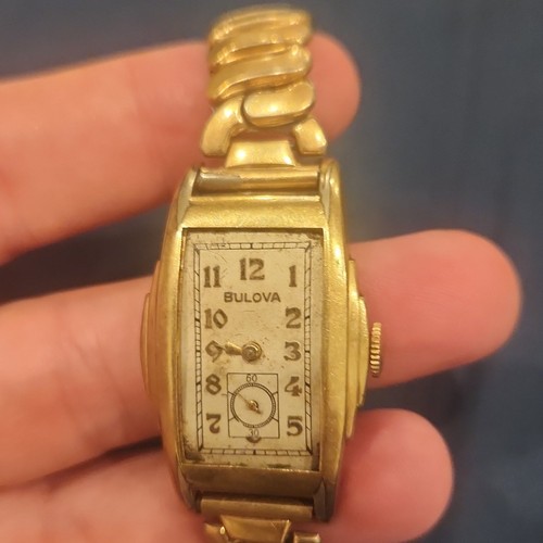 Bulova gold rectangle analog - bulova,