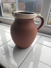 Vintage traditional pottery milk jug glazed rim and interior