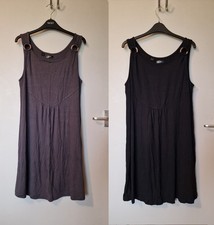 Two simple dresses with wooden hoop details, greay and black. BPC UKM