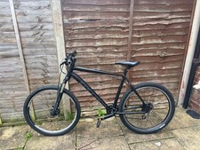 carrera sr suntour xcm32 bike mens L great condition black mountain bike