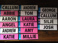 LARGE COLLECTION SMALL PRESSED METAL CAR SHOW NAME NUMBER PLATES AUTOJUMBLE