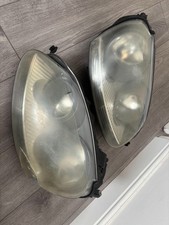VOLKSWAGEN GOLF FSI  FRONT RIGHT AND LEFT HEADLIGHT HEADLAMP GOOD CONDITION