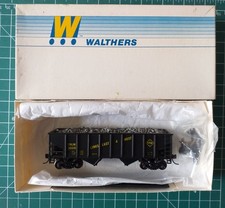 Walthers HO scale 36' hopper fitted with Kadee couplers and P2000 wheelsets.