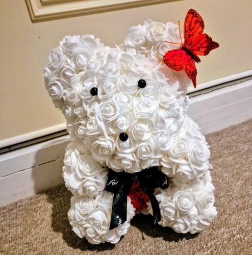 Bear with white forever roses