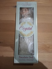 porcelain doll in box