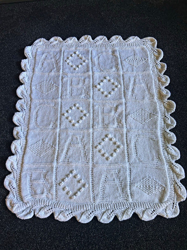Hand knitted baby alphabet
