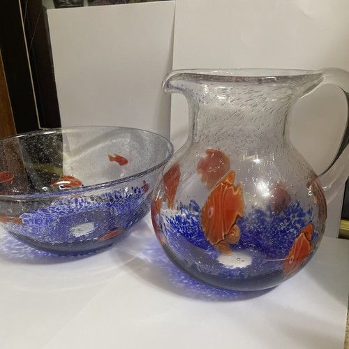 Hand blown glass pitcher - hand,