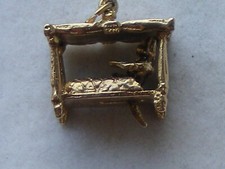 A 9ct GOLD ARTICULATED FOUR POSTER BED  4.38grms for a CHARM/ PENDANT