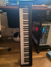 Gymax 61-Key Folding Piano