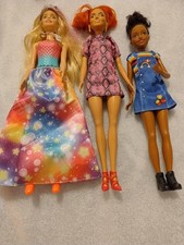 Two Barbies And Skipper