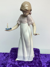 NAO by Lladro  Figurine "To Light The Way." 01155 (26 cm)