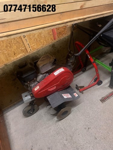 Brings and stratton rotivator - and,