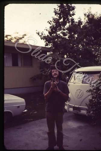 Hippie man holding cat - hippie,