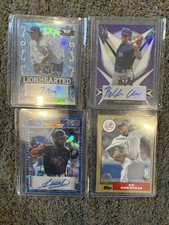 Four Baseball Trading Cards Each In A Protective Case. Great for Collectors