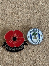 Lest We Forget Remembrance and a Wigan Athletic metal/enamel  pin badge,
