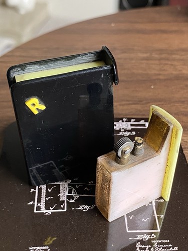 Celluloid plastic book lighter - celluloid,