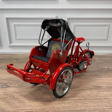 Red Metal Rickshaw Sculpture