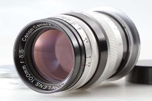 Near mint canon 100mm f3 - mint*,