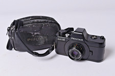 Pentax Auto 110  SLR  f/2.8 24mm Lens + Free Pentax SLR Auto 110 Body and Case.