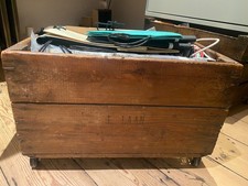 Vintage wooden oak coloured apple crate on wheels great for toy storage