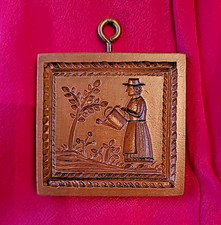 Woman Watering Garden Flowers