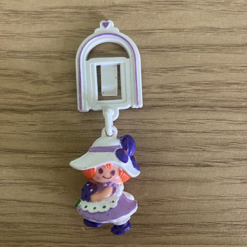 Blossom figure and - charm,