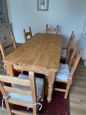 farm house-style solid pine table and six beech chairs